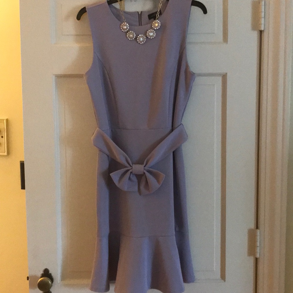 Beautiful lavender dress with flounce and bow!